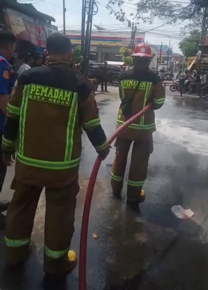 Penyiraman Tumpahan Minyak